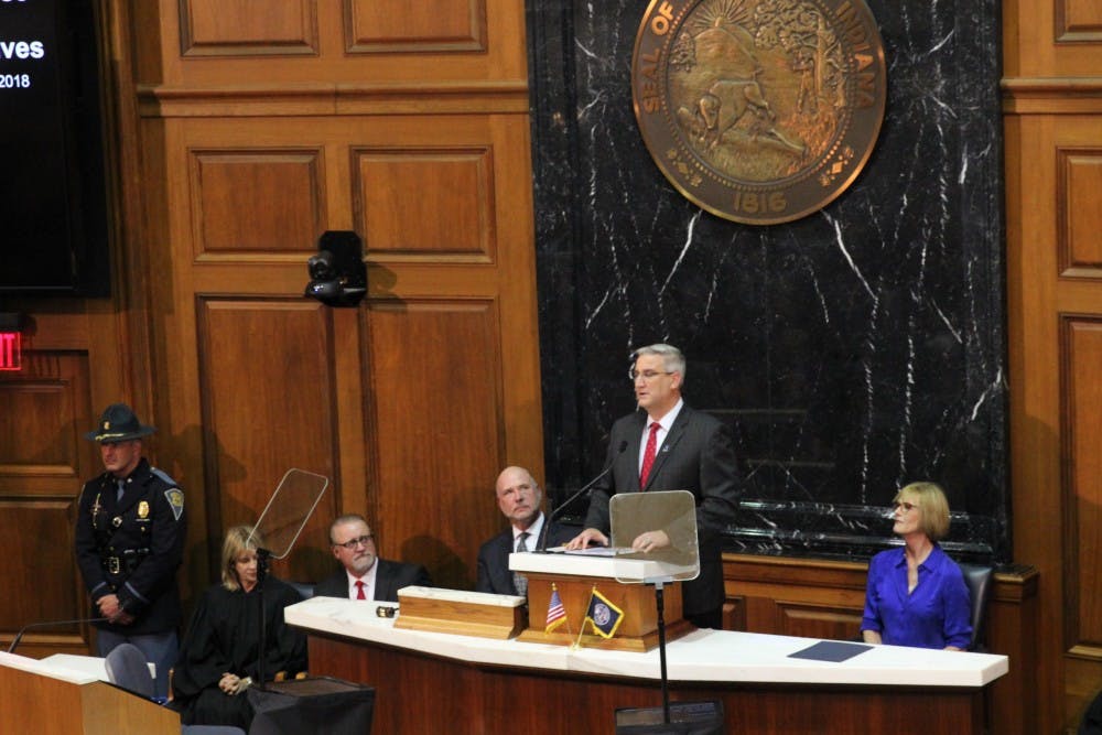 <p>Gov. Eric Holcomb delivers his second State of the State address at the Indiana State Building Tuesday, Jan. 9, 2018. Holcomb focused on continuing his five-year pillar plan. <strong>Andrew Smith, DN</strong></p>