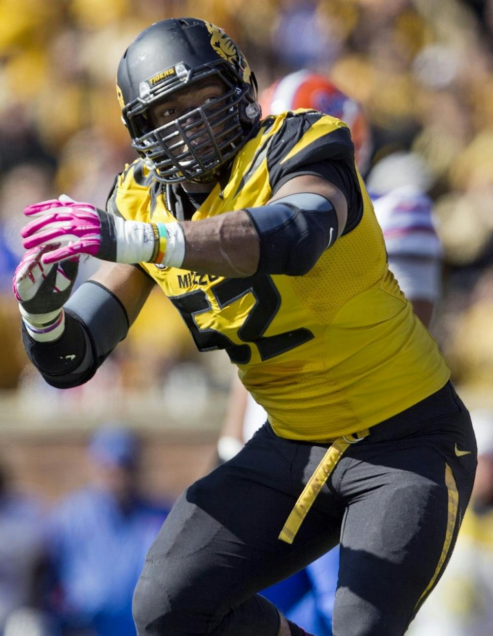 Missouri Tigers defensive lineman Michael Sam on Sunday, Feb. 9, 2014, became the most prominent, and apparently the first, active male athlete on the major U.S. sports scene to publicly disclose that he&apos;s gay. Sam is seen during a college football game against Florida in this October 19, 2013, file photo. MCT PHOTO