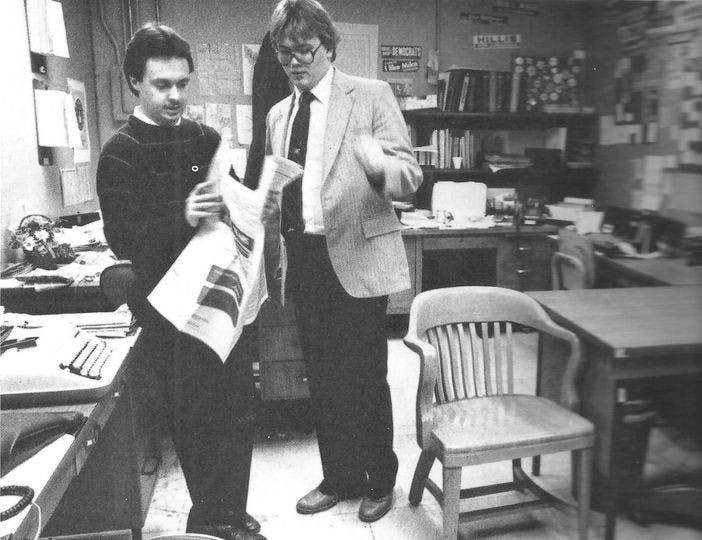 Greg Weaver and Jeff Crosby work in an Indiana Statehouse press shack in 1983 while covering the Indiana General Assembly. That same year, the Daily News won Newspaper of the Year at ICPA. Greg Weaver, Photo Provided 