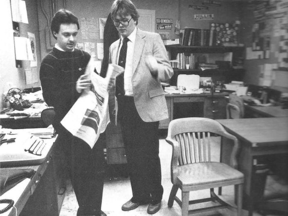Greg Weaver and Jeff Crosby work in an Indiana Statehouse press shack in 1983 while covering the Indiana General Assembly. That same year, the Daily News won Newspaper of the Year at ICPA. Greg Weaver, Photo Provided 