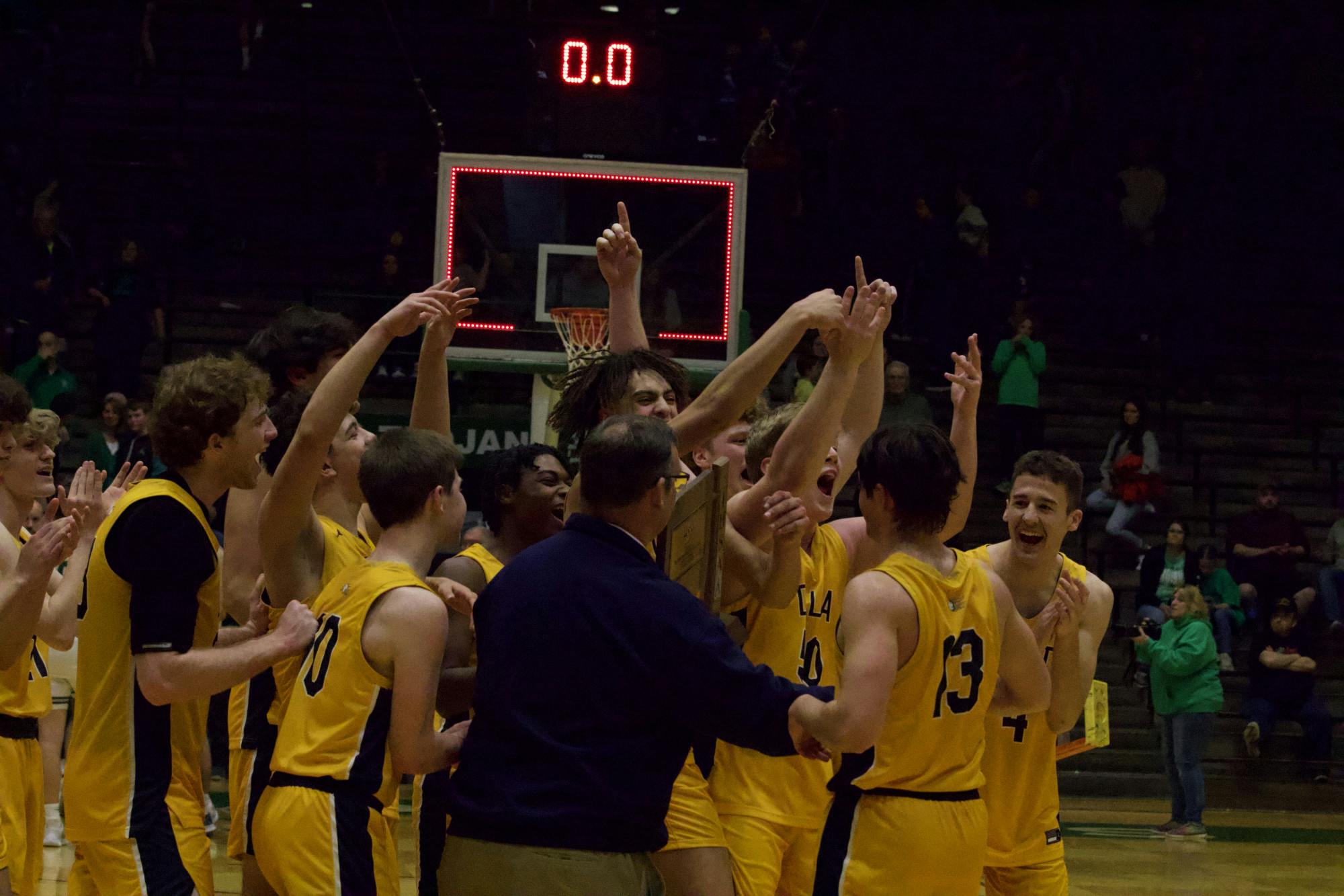The Delta Eagles celebrate their 50-37 victory over New Castle Saturday, March 3 to become Class 3A Sectional 24 champions. Zach Carter, DN