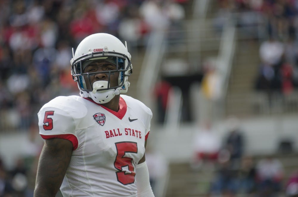 Senior corner back Eric Patterson waits for a play to begin during the game against Indiana State on Sept. 13 at Scheumann Stadium. DN PHOTO BREANNA DAUGHERTY 