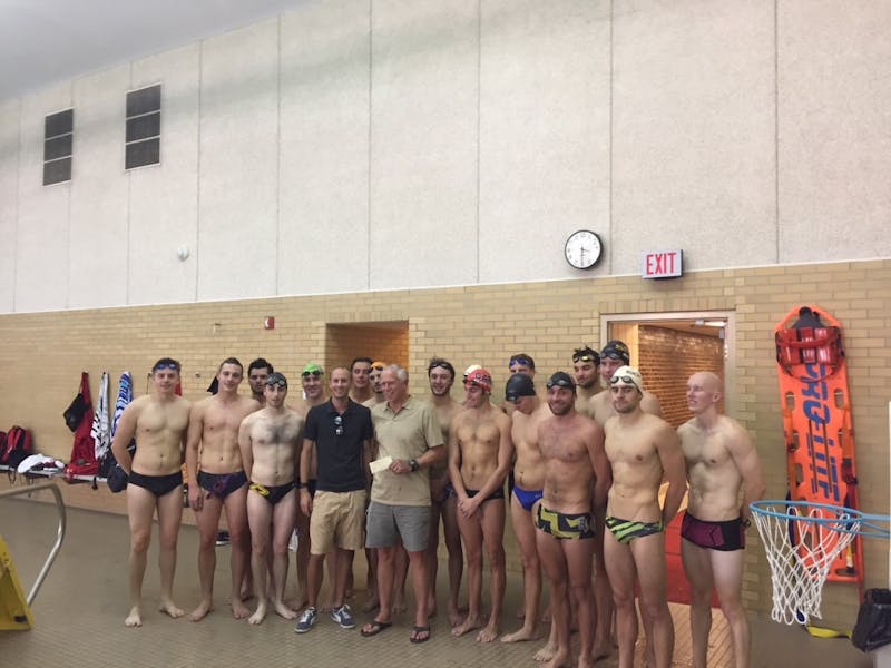 Former Ball State diver Zach Whitaker stands with the current men's swimming and diving team. Whitaker gave the men's swimming and diving program was $1,000, mini refrigerator for the team’s locker room and cases of Gatorade to stock it. Zach Whitaker, Photo Provided