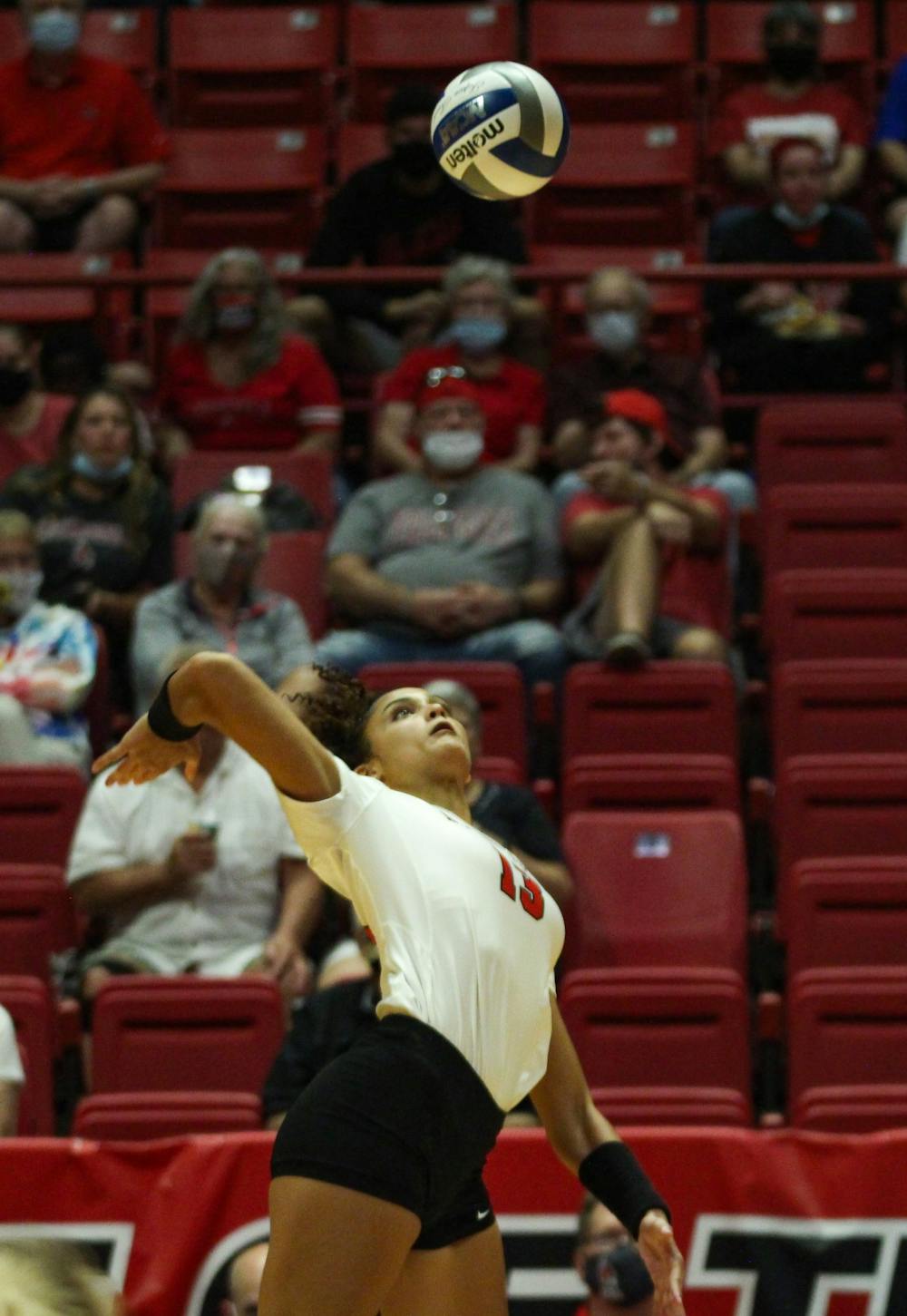 Junior opposite hitter Natalie Mitchem spikes the volleyball set to her by freshman Megan Wielonski against Northern Kentucky in Worthen Arena Sept. 17. Ball State took the win for its first home game of the 2021 season. Jacy Bradley, DN