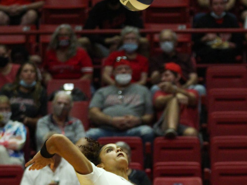 Junior opposite hitter Natalie Mitchem spikes the volleyball set to her by freshman Megan Wielonski against Northern Kentucky in Worthen Arena Sept. 17. Ball State took the win for its first home game of the 2021 season. Jacy Bradley, DN