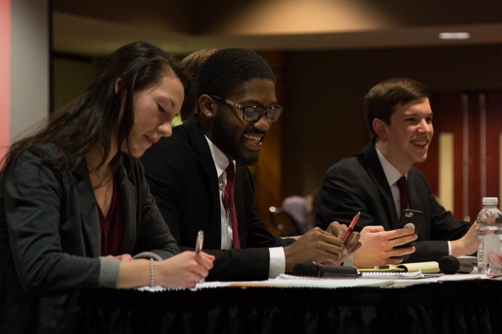 <p>Kyleigh Snavely, secretary, Jalen Jones, treasurer, Matt Hinkleman, vice president, and Isacca Mitchell, president of Amplify during the 2018 All Slate debate hosted by the Student Government Association at L.A. Pittenger Student Center on Feb 18.<strong> Eric Pritchett, DN</strong></p>