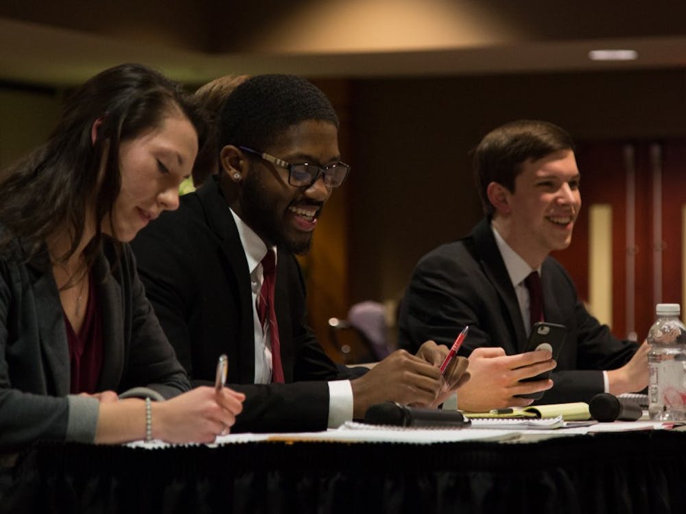 Kyleigh Snavely, secretary, Jalen Jones, treasurer, Matt Hinkleman, vice president, and Isacca Mitchell, president of Amplify during the 2018 All Slate debate hosted by the Student Government Association at L.A. Pittenger Student Center on Feb 18. Eric Pritchett, DN