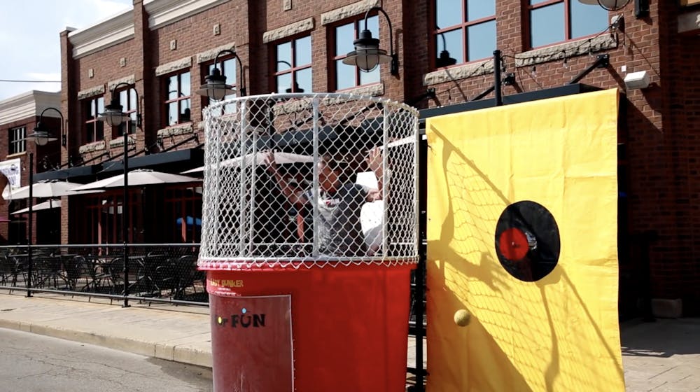 VIDEO: Charity Dunk Tank at $2 Tour of the Village