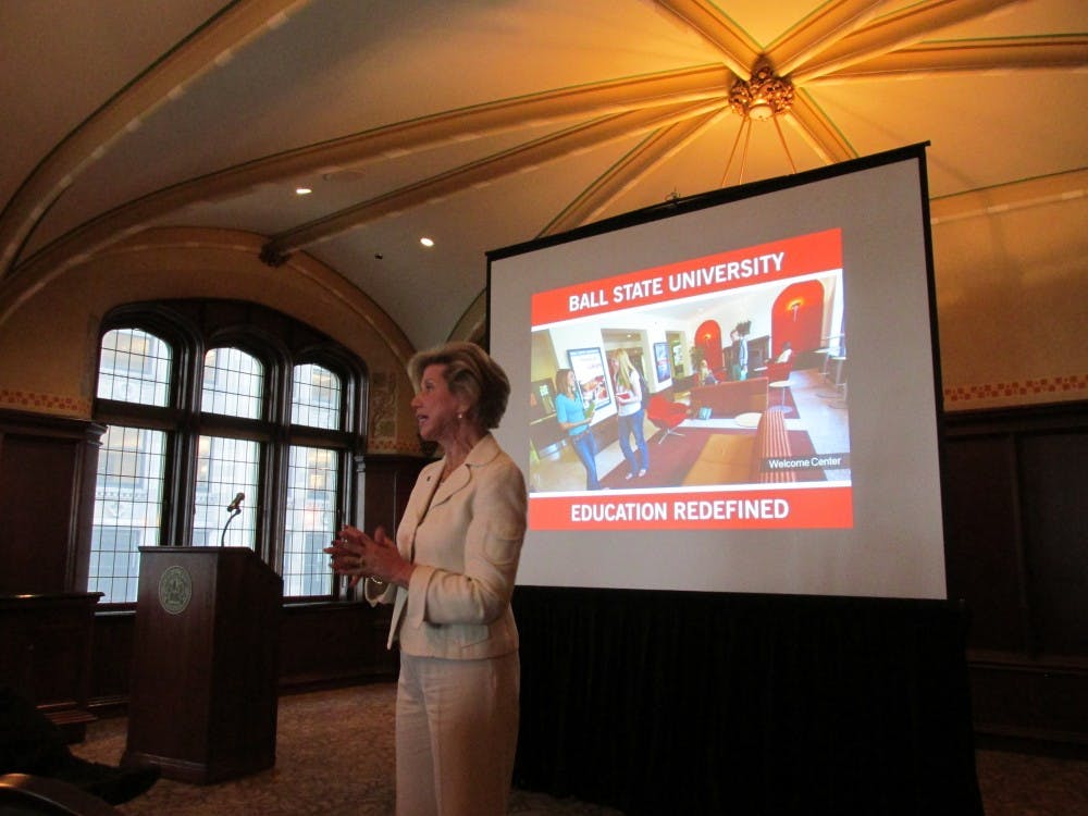 <p><strong>President Jo Ann Gora </strong>speaks to alumni May 15 at the University Club of Chicago. Gora chose not to stand behind the podium and speak into the microphone. Instead, she chose to have a conversation with attendees. <strong>DN PHOTO RAYMOND GARCIA</strong></p>