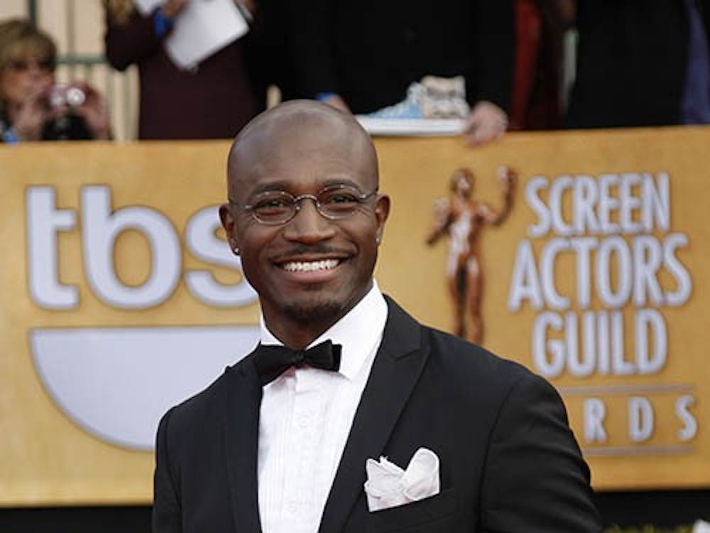 Taye Diggs arrives for the 19th annual Screen Actors Guild Awards Sunday at Shrine Auditorium in Los Angeles, Calif. Diggs chased a burglar out of his garage after returning from the awards show. MCT PHOTO
