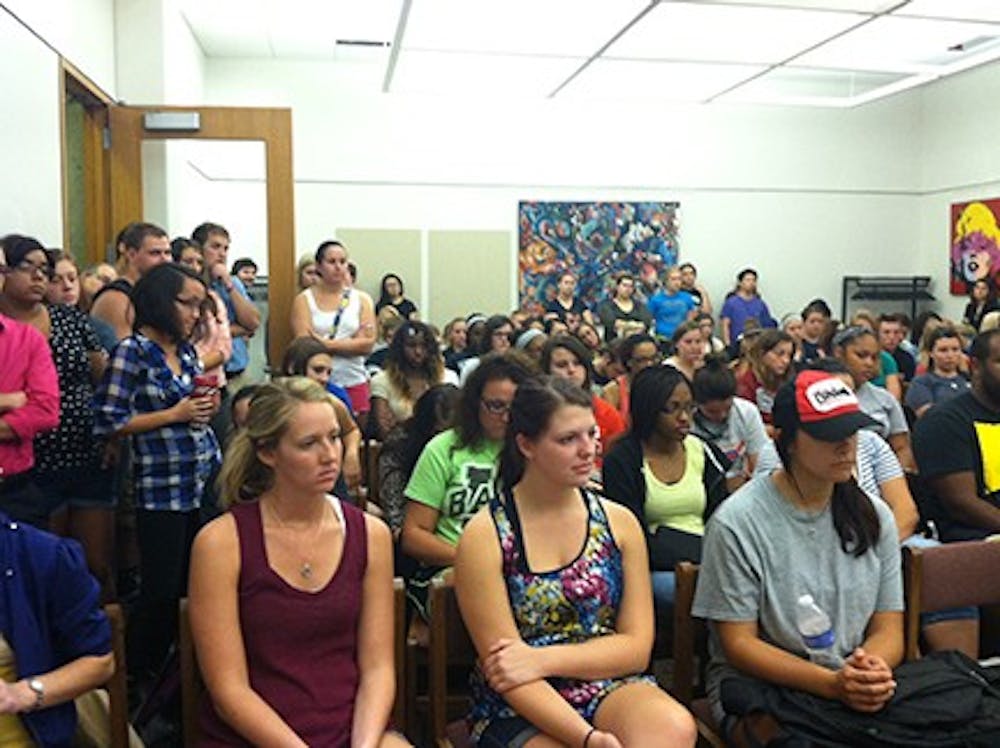 Students crowd into a room in Bracken Library Thursday for a discussion panel focused on diversity. The event was promoted as "#americaisbest" following tweets by a former Student Government Association president. DN PHOTO RACHEL PODNAR
