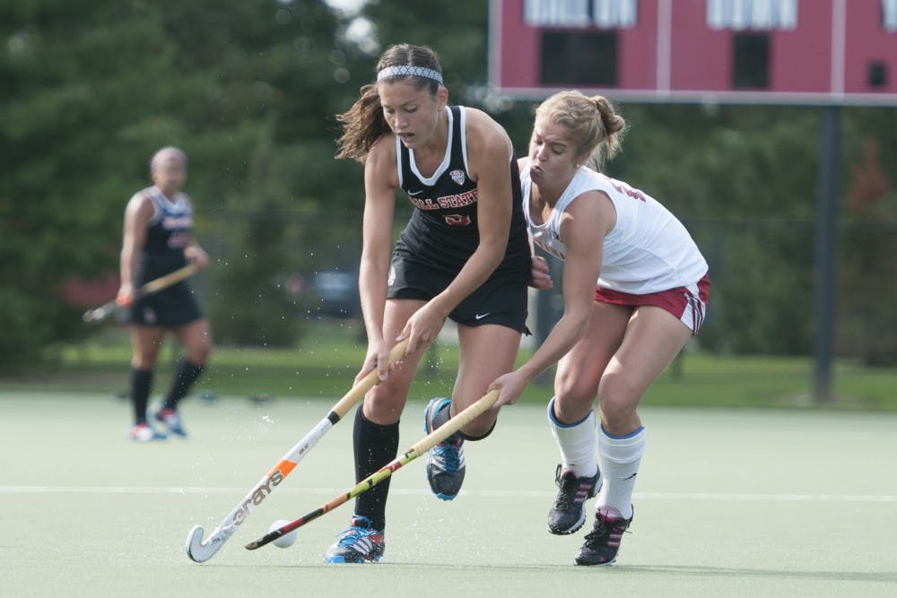 Junior midfielder Bethany Han contends with the Indiana University defense on Sept. 17 at the BSU Turf field. DN PHOTO JONATHAN MIKSANEK