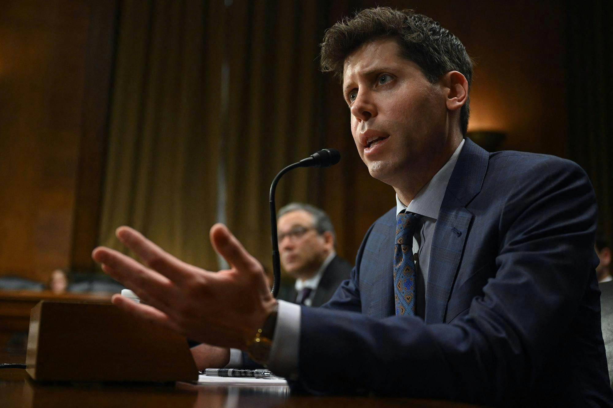 Samuel Altman, CEO of OpenAI, testifies during a Senate Judiciary Subcommittee on Privacy, Technology, and the Law oversight hearing to examine artificial intelligence, on Capitol Hill in Washington, D.C., on Tuesday, May 16, 2023. (Andrew Caballero-Reynolds/AFP/Getty Images/TNS)