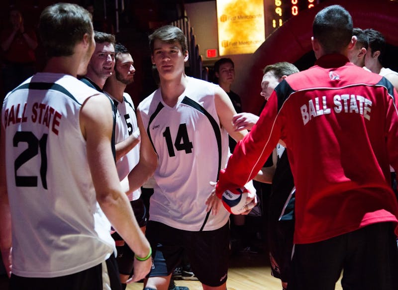 Freshman outside attacker Matt Szews is greeted by his team with the rest of the starters at the game against Ohio State on Feb. 2 in Worthen Arena. The Cardinals lost 3-0 to the Buckeyes. Kaiti Sullivan // DN