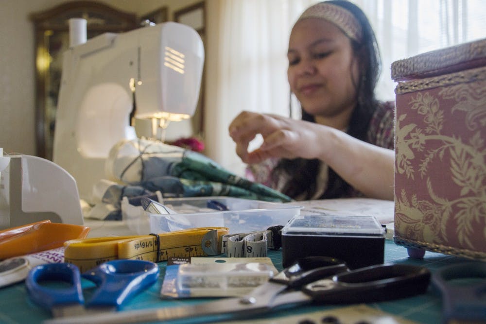 For the fashion show, Fanning entered three garments. One is a Japanese-style kimono. She decided to make the kimono when she found satin she liked at Jo Ann Fabrics. Fanning decided to make a kimono because it would be something different. Another piece she entered is a 1950s dress she made in around four weeks for class. Fanning decided to make a dress because other students were making blouses. The final piece Fanning entered is a knit cardigan she made in her class as well. While students were making leggings, she decided to do a cardigan because it would be something easy to put on during the fall. “I just love to be creative and different,” she said.