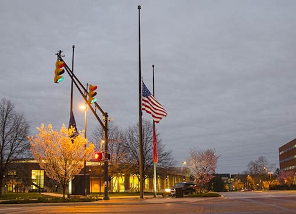 The flags at the corner of McKinley and Neely avenues remain at half staff after the events of the Boston Marathon on Monday. President Barack Obama ordered flags to remain at half staff through Saturday. DN PHOTO COREY OHLENKAMP