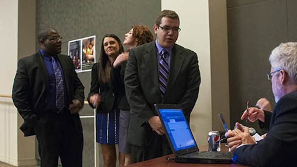 The members of Cardinal United begin the process to have their slate nomination approved by the SGA Election Committee. There were three slates nominated at the event. DN PHOTO BOBBY ELLIS