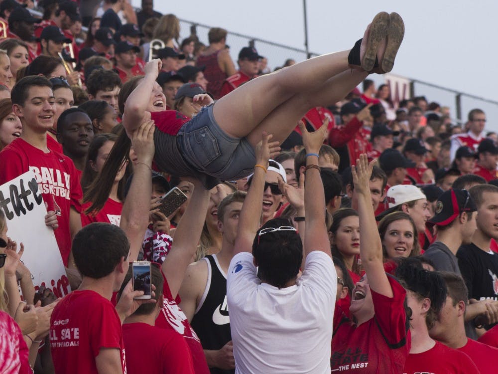 A fan is lifted during the football game against Virginia Military Institute on Sept. 3 at Schuemann Stadium DN PHOTO MAKAYLA JOHNSON