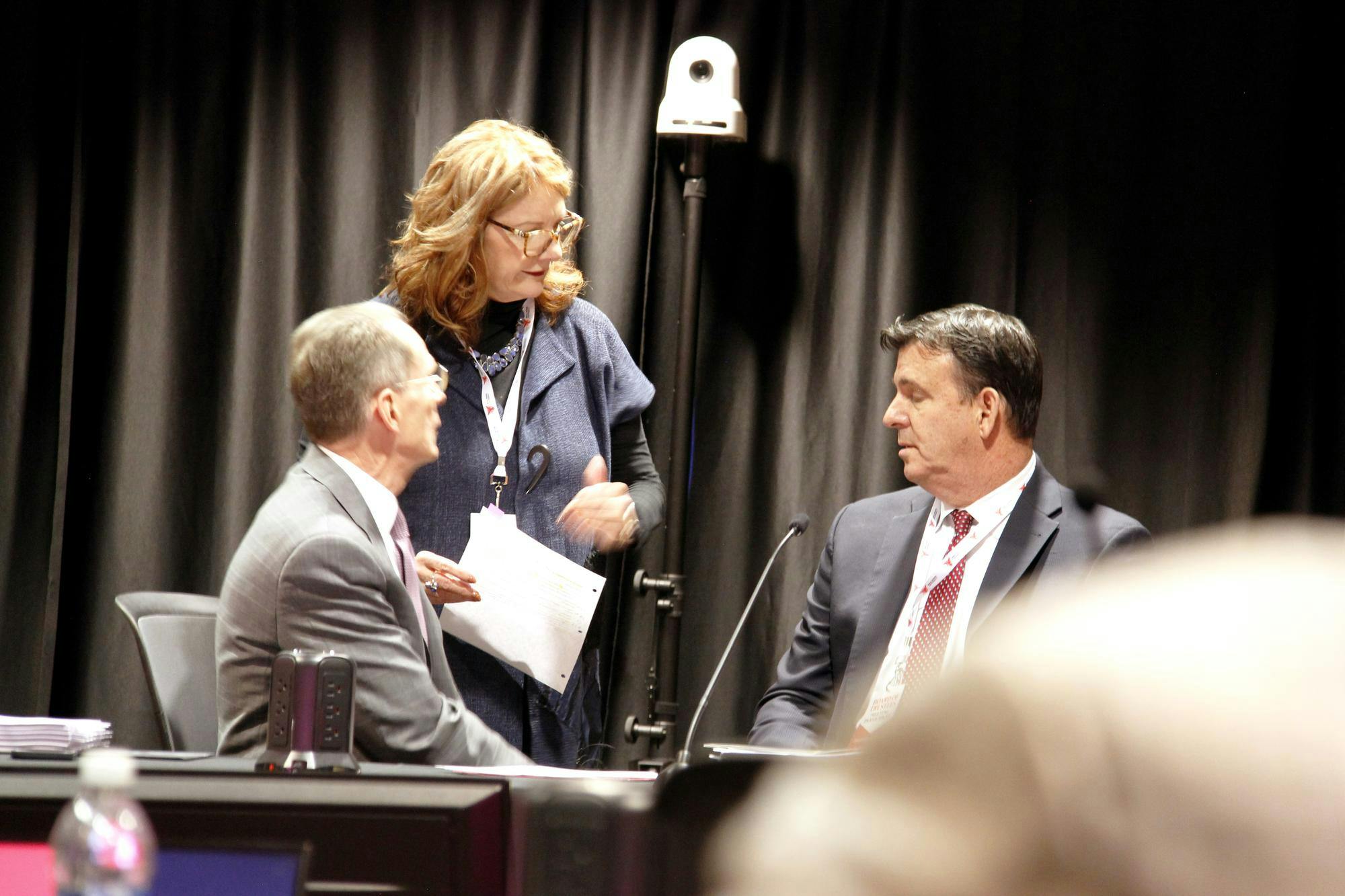 Ball State University President Geoffrey Mearns (L) in conversation with Sue Hodges Moore, the university's interim vice president for business affairs and interim treasurer and Rick Hall (R), the university's Board of Trustee Chair, during the lunch break of the Dec. 12 board meeting in the university's L.A. Pittenger Student Center Cardinal Hall A. Katherine Hill, DN