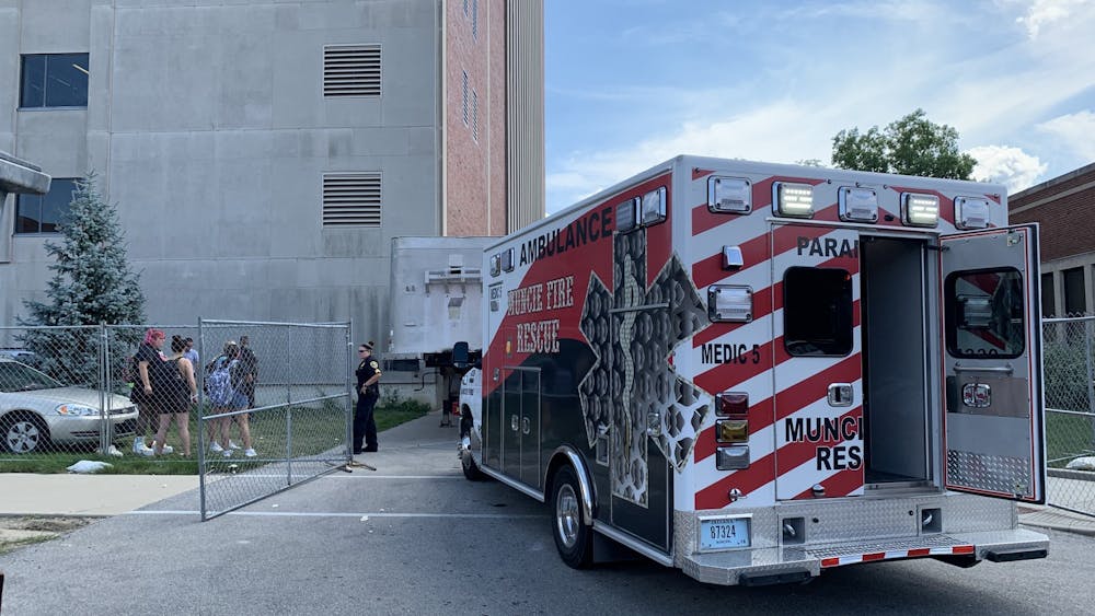 A Muncie Fire Department ambulance parks outside Teachers College after construction accident. Angelica Gonzalez Morales, DN.