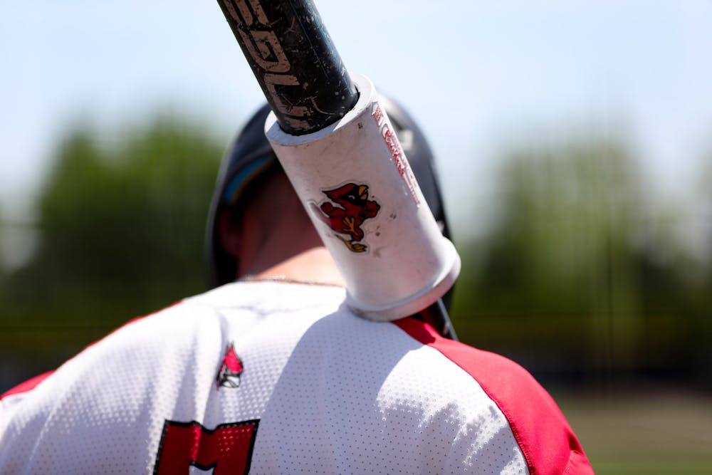 <p>Senior infielder Ryan Peltier stands on deck in a game against Ohio May 15. Peltier had 1 RBI for the Cardinals. Jacy Bradley, DN</p>