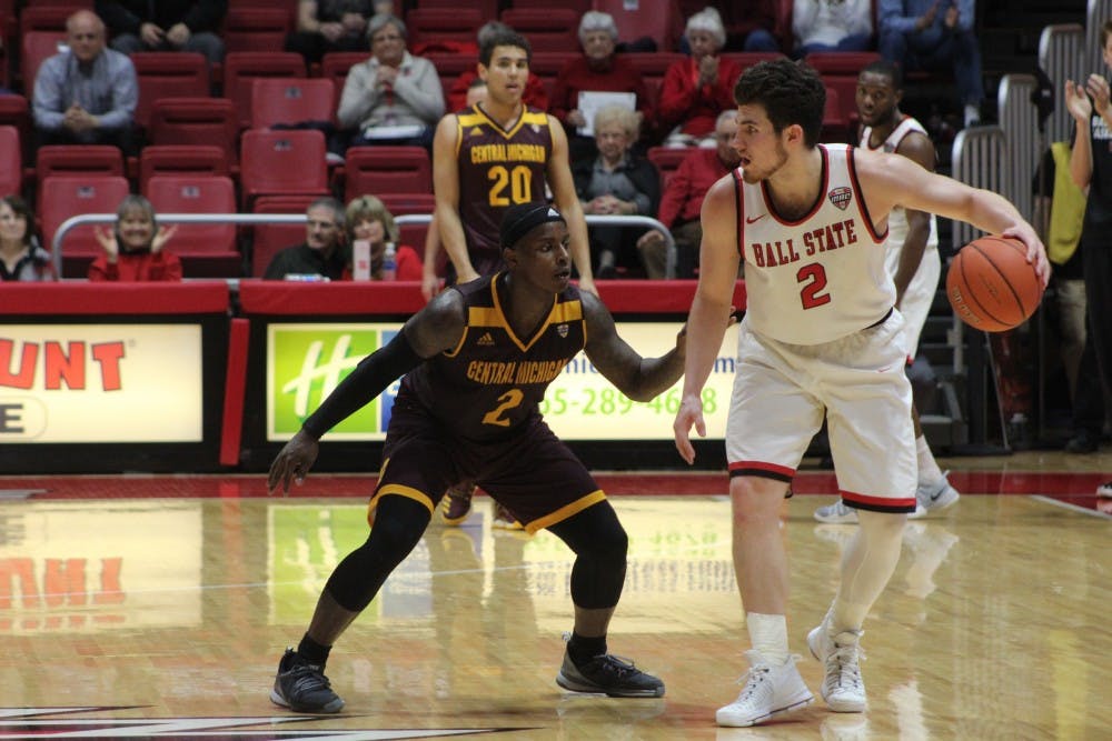 Sophomore guard Tayler Persons attempts to get past a CMU defender on Jan. 17 at Worthern Arena.  The Cardinals next home game is against Western Michigan on Jan. 28.  DN // Patrick Murphy
