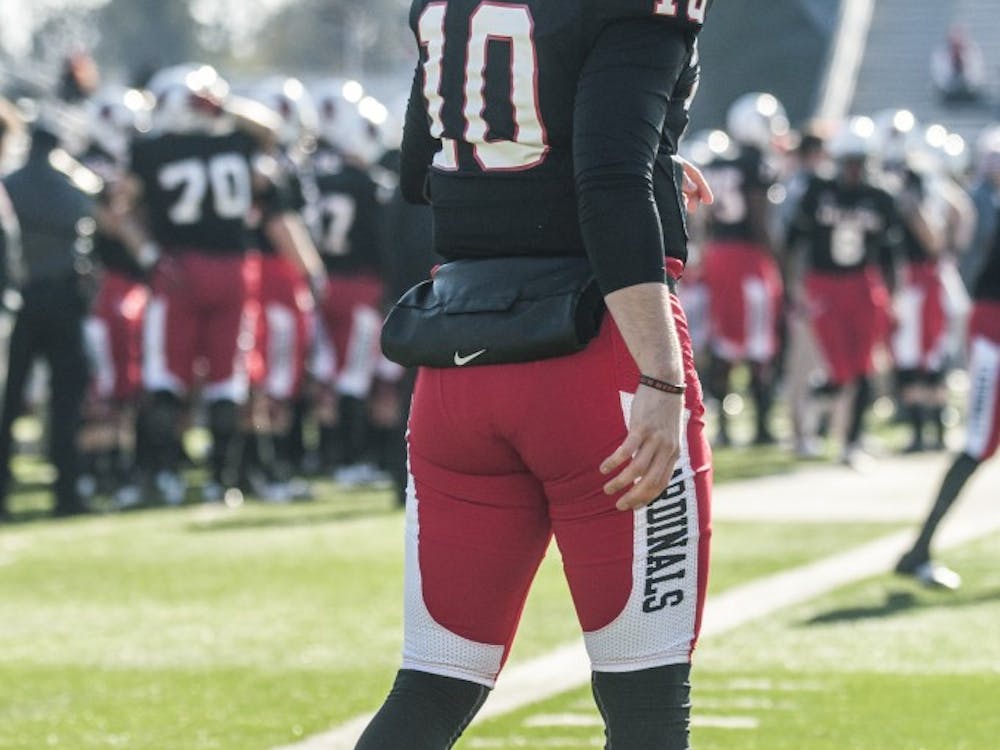 Senior quarterback Keith Wenning warms up on the field prior to the start of the game against Miami on Nov. 29. Wenning plans to graduate at the end of the year, making Miami the last home game he will play for Ball State. DN PHOTO JONATHAN MIKSANEK