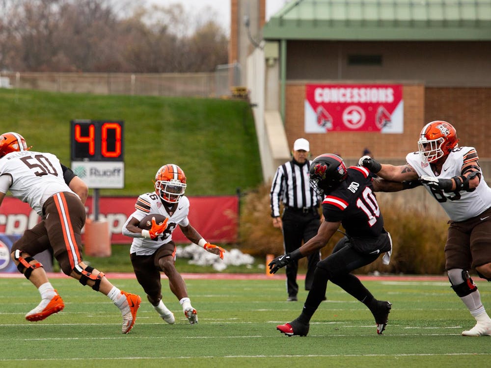 Junior wide receiver Rahkeem Smith runs with the ball Nov. 23 at Scheumann Stadium. Smith played in all games with one start this season. Isabella Kemper, DN