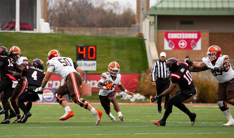 Junior wide receiver Rahkeem Smith runs with the ball Nov. 23 at Scheumann Stadium. Smith played in all games with one start this season. Isabella Kemper, DN