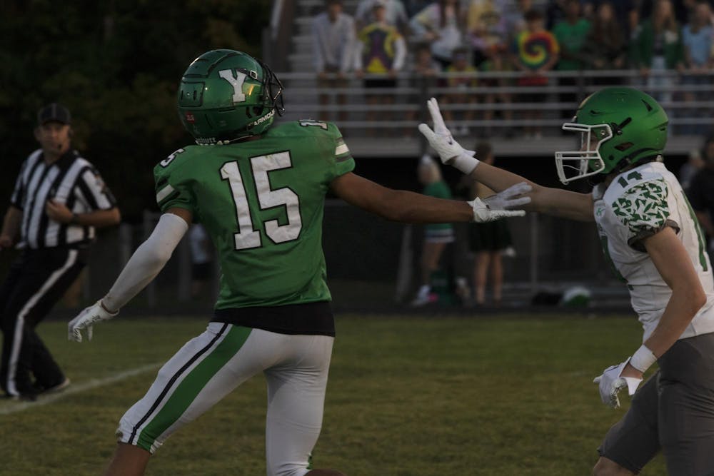 Yorktown junior Ephraim Daughtery looks for the ball September 15 during a game against New Castle. David Moore, DN.