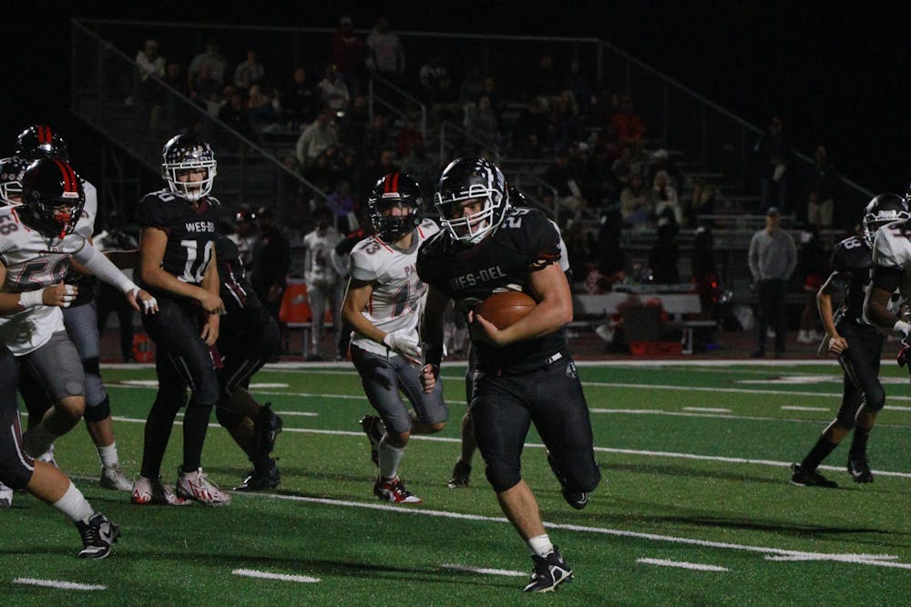 Wes-Del junior running back Brock Mauman runs Oct. 4 during a game against Park Tudor at Wes-Del Middle/High School. Nauman had eight rushing touchdowns. Zach Carter, DN