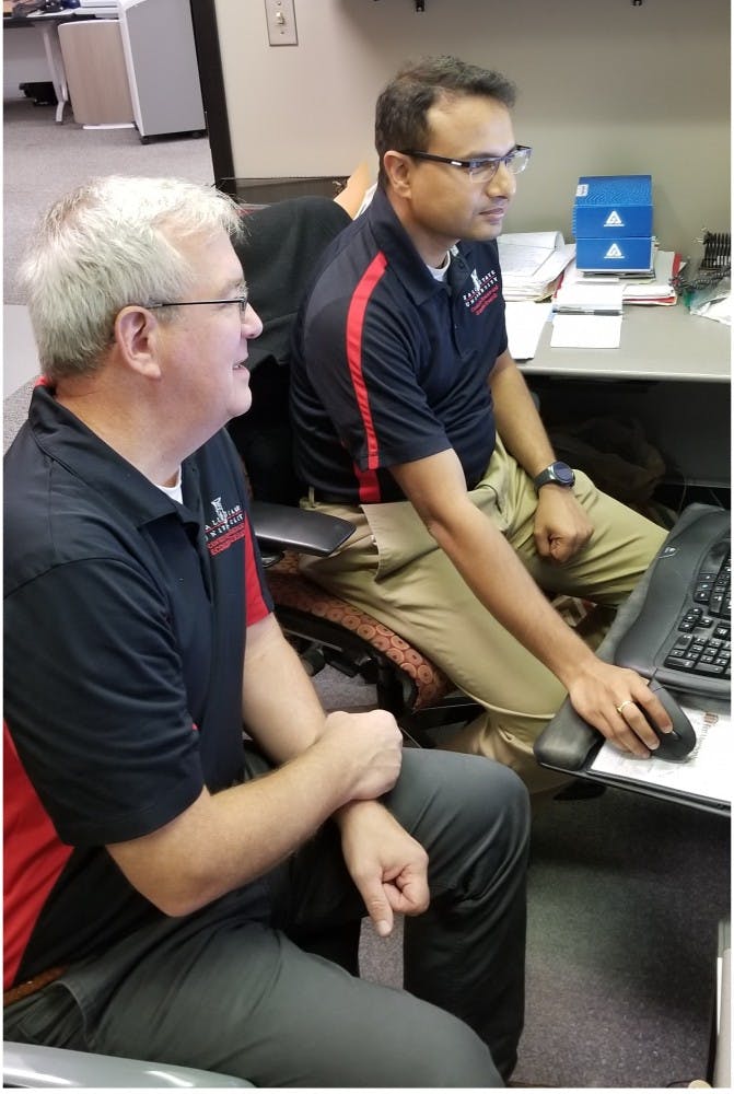 Micheal Hicks, &nbsp;director of Center for Business and Economic Research, and Srikant Devaraj, &nbsp;research economist and research assistant professor, go over their study. The 2019 Manufacturing Scorecard gave Indiana an A grade in both its manufacturing and logistics industry. Photo Provided, 2019.&nbsp;