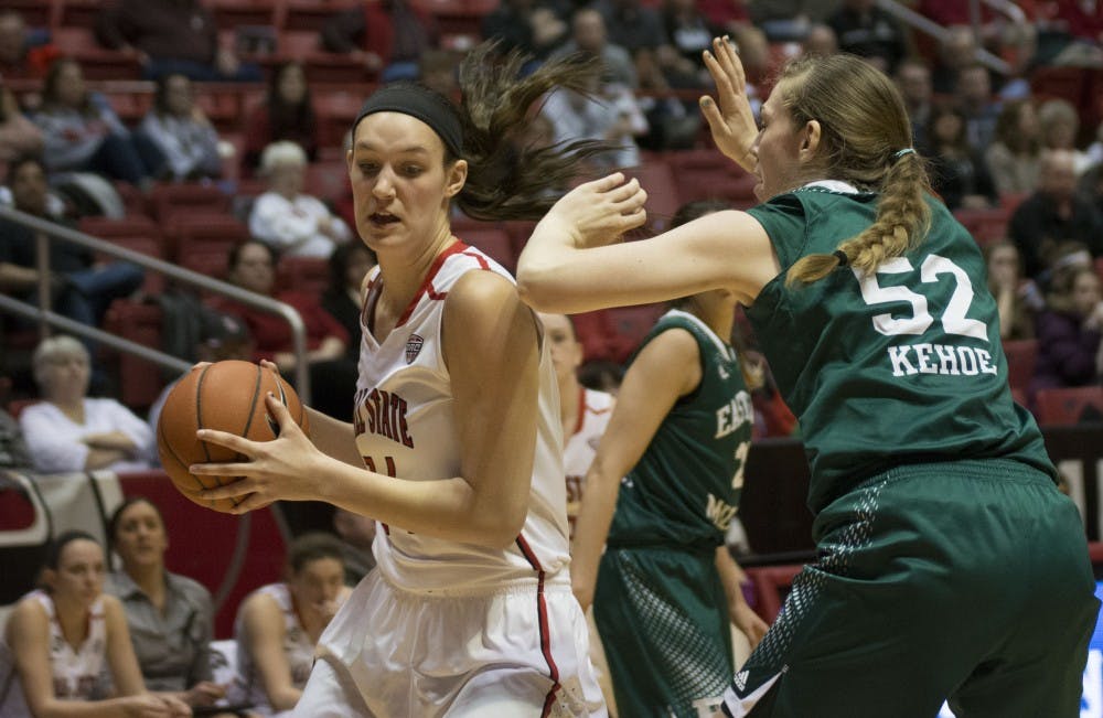 Sophomore center Renee Bennett looks to drive the ball during the game against Eastern Michigan on Feb. 25 at Worthen Arena. DN PHOTO AMER KHUBRANI