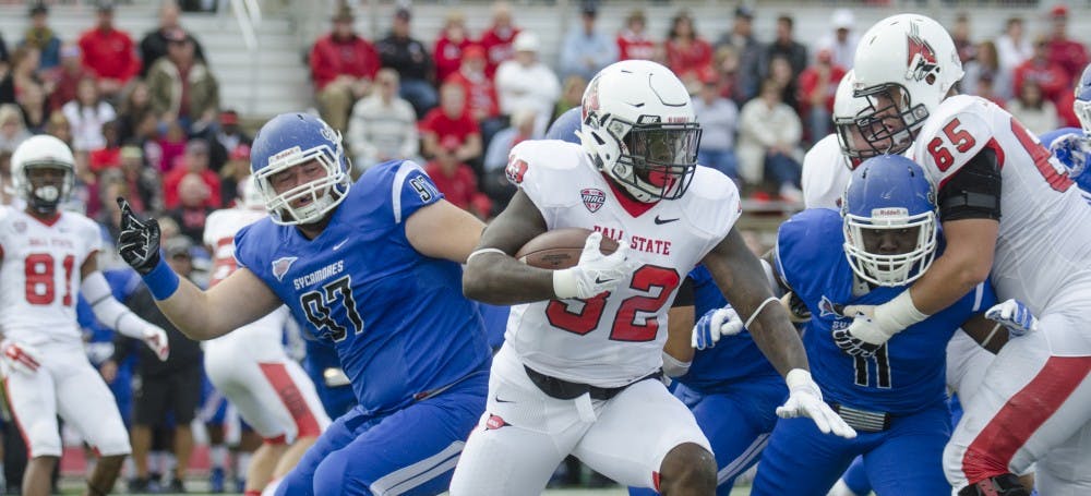 Senior running back Jahwan Edwards runs the ball during the game against Indiana State on Sept. 13 at Scheumann Stadium. DN PHOTO BREANNA DAUGHERTY 