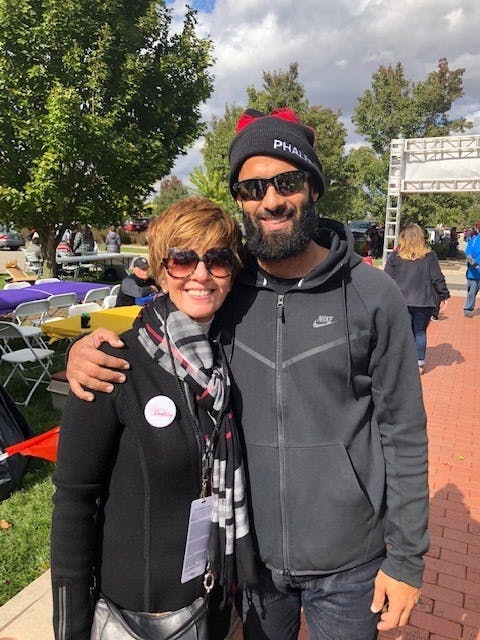 : Renae Conley, chair for the Ball State Board of Trustees, takes a photo with her son Ali Conley. Renae also currently serves as CEO of ER Sollutions LLC. Ball State University, Photo Provided
