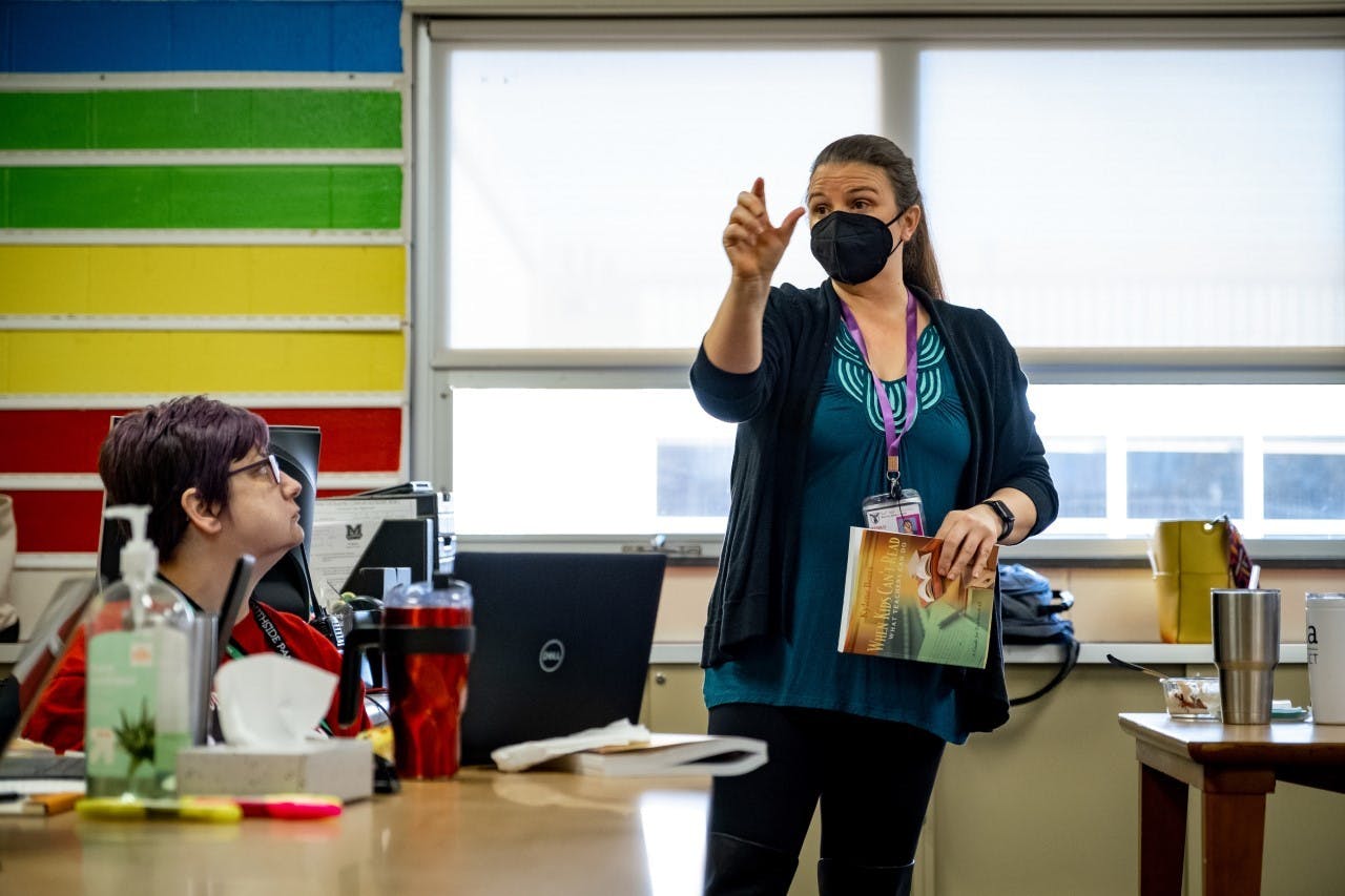 Susanna Benko, Ball State director of English education and associate professor of English, assists in one of the Muncie Community Schools (MCS) classrooms. Benko works as a PDS liaison at three MCS schools. Sari Harris, Photo Provided 