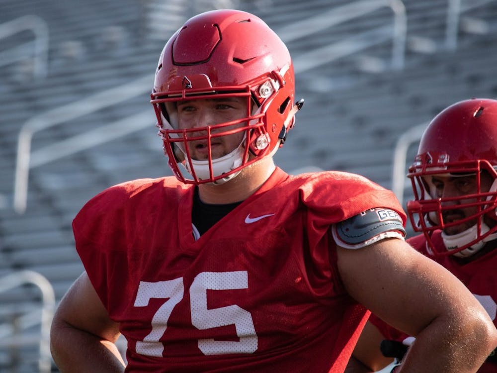 Redshirt junior offensive lineman Danny Pinter stands in line to do a drill at practice Monday, Aug. 27, 2018 at Scheumann Stadium. In 2017 Pinter had a season-ending injury in the game against Central Michigan. Rebecca Slezak,DN