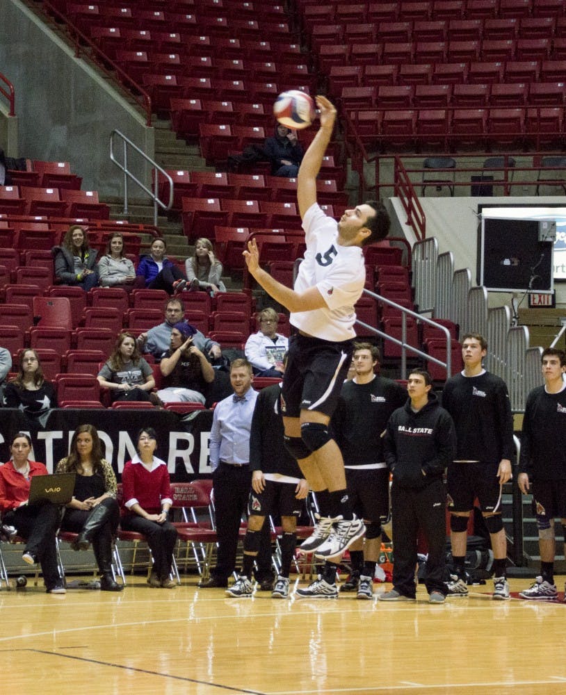 Sophomore outside attacker Edgardo Cartagena serves the ball during the game against Lewis on Feb. 12 at Worthen Arena. DN PHOTO ALAINA JAYE HALSEY