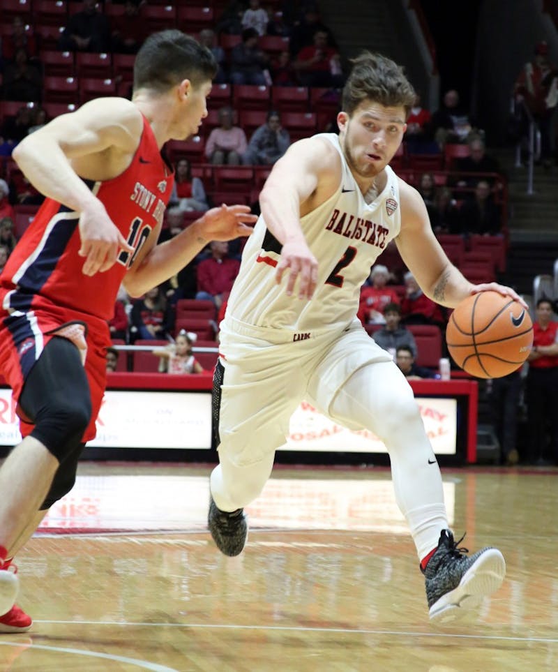 Junior guard Tayler Persons brings the ball down the court during the Cardinals’ game against Stony Brook on Nov. 17 in John E. Worthen Arena. Persons was the leading scorer for Ball State with 29 points. Paige Grider, DN