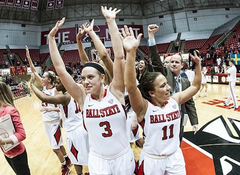 The Ball State women’s basketball team waves to the crowd after their 53-48 victory over Northern Iowa on March 24, 2013. The team will progress to the WNIT’s Sweet 16. DN PHOTO JONATHAN MIKSANEK