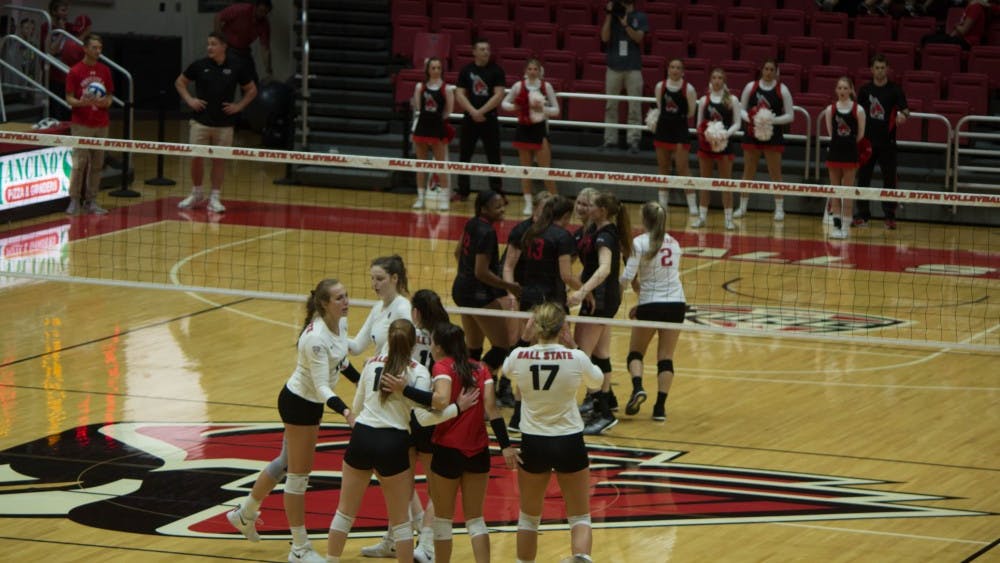 The Ball State Women's Volleyball team regroups between plays Sept.11, 2018, at Worthen Arena. The Cardinals defeated the Jaguars 3-0. Alex Straw,DN