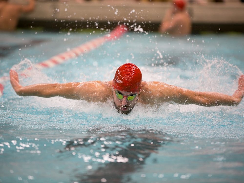 Sophomore Ben Andrew swims butterfly in the 400-yard medley relay during the meet against Grand Valley State on Nov. 18 in Lewellen Pool. Kaiti Sullivan, DN