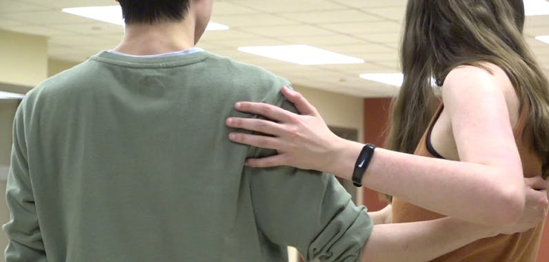 Students listening intently as they learn a new routine/move.