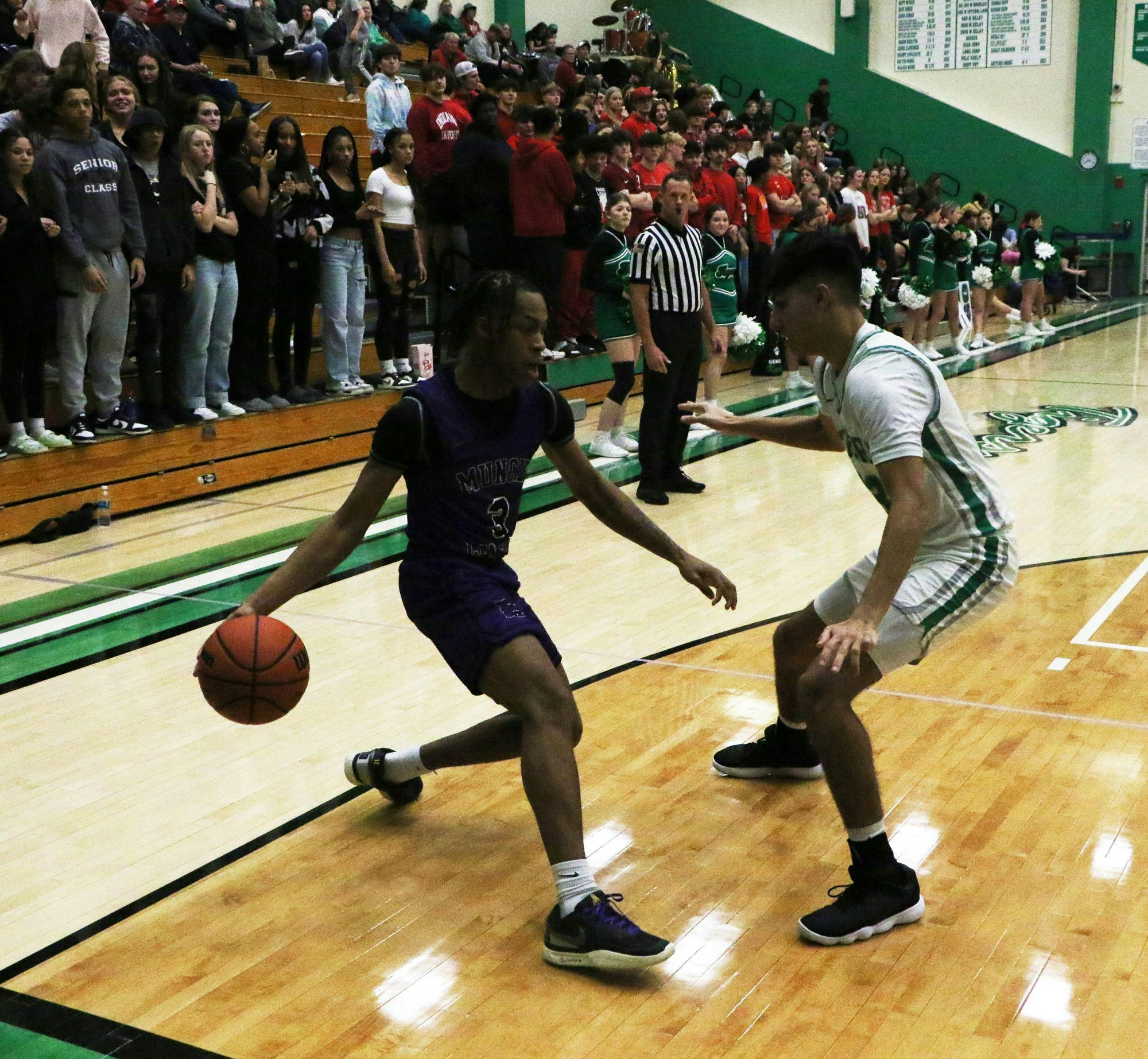 Muncie Central High school senior DeMarkis Cole dribbles the ball against Yorktown Feb. 13 at Yorktown high school. David Moore, DN