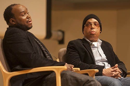 Shawn Simons and Alvaro Llanos speak about life after the fire that left them both permanently scarred in 2000. Simons read a passage from their book about the event while speaking Monday in Pruis Hall.  DN PHOTO JORDAN HUFFER