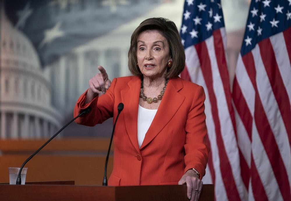 Speaker of the House Nancy Pelosi, D-Calif., talks to reporters just before the House vote on a resolution to formalize the impeachment investigation of President Donald Trump, in Washington, Thursday, Oct. 31, 2019. (AP Photo/J. Scott Applewhite)