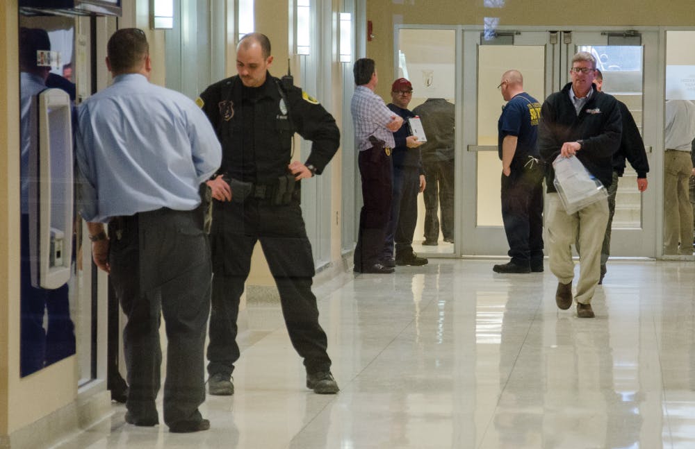 Students were notified at 5:49 p.m. Wednesday about “potentially hazardous materials introduced to money found at the Ball State Federal Credit Union.” Emergency personnel investiaged the closed-off area. After that, an all-clear was issued. DN PHOTO BREANNA DAUGHERTY