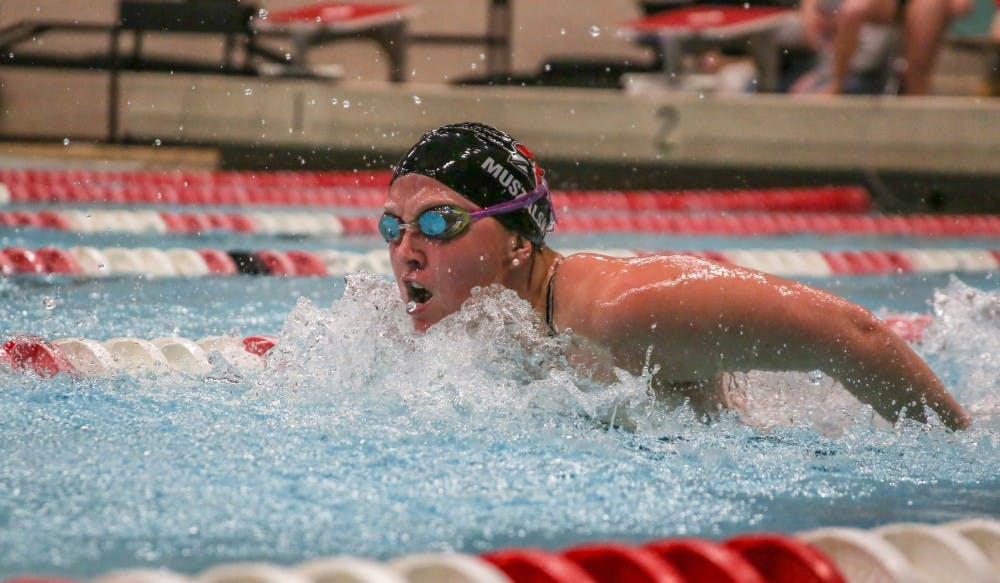 <p>Senior Traci Muszalski competes in the 200 butterfly during the meet against Buffalo Jan. 27 in Lewellen Pool. Muszalski finished sixth.<strong> Kaiti Sullivan, DN File</strong></p>
