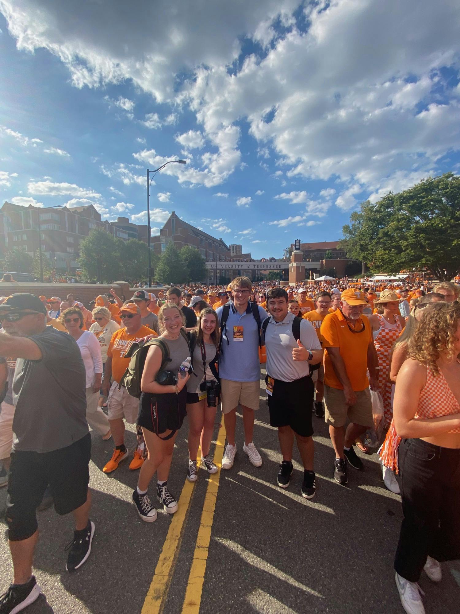 Ball State Daily News Associate Photo Editor Jacy Bradley, Visual and Photo Editor Amber Pietz, News Editor Kyle Smedley, and Sports Editor Daniel Kehn pose for a group photo on Phillip Fulmer Way in Knoxville, Tennessee Sept. 1, 2022. Photo provided. 
