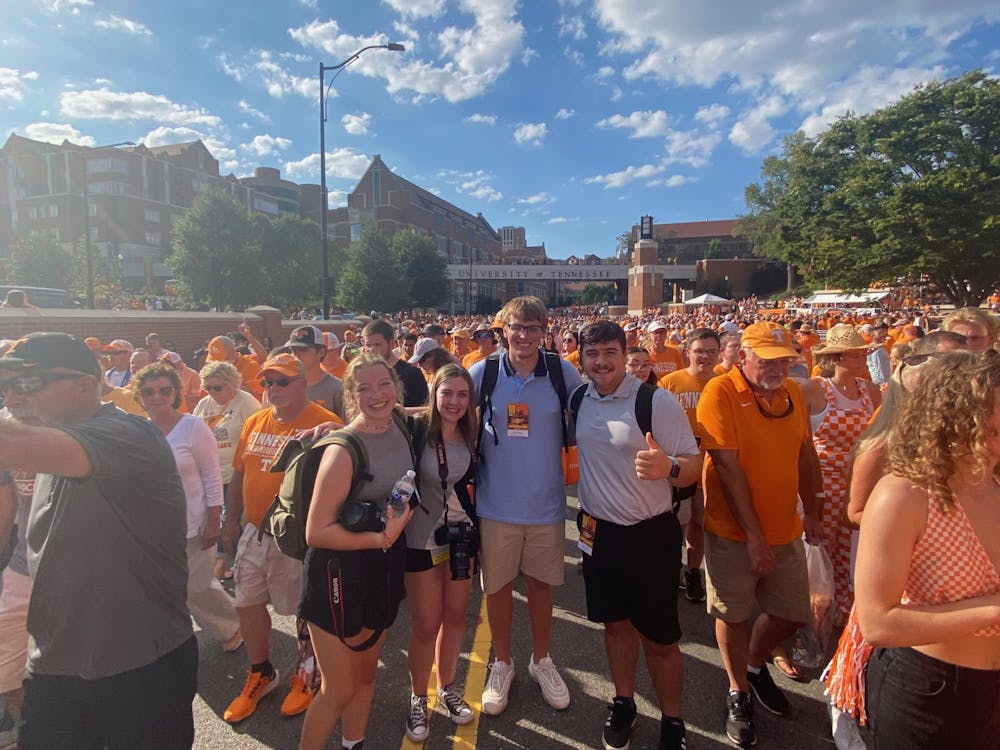 Ball State Daily News Associate Photo Editor Jacy Bradley, Visual and Photo Editor Amber Pietz, News Editor Kyle Smedley, and Sports Editor Daniel Kehn pose for a group photo on Phillip Fulmer Way in Knoxville, Tennessee Sept. 1, 2022. Photo provided. 